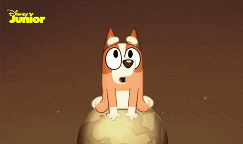 a cartoon dog is sitting on top of a globe with a disney junior logo behind it