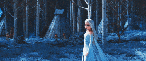 a woman standing next to a blue horse that is covered in ice