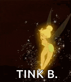 tinkerbell from disney 's tinkerbell is glowing brightly in the dark .