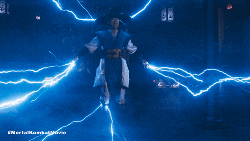 a man in a cowboy hat is surrounded by lightning and the hashtag #mortalkombatmovie