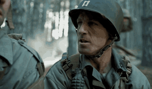 a soldier wearing a helmet with the letter a on it