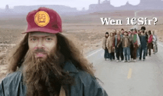 a man with a beard is wearing a red hat that says ' wen 1e sir ' on it