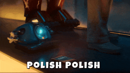 a person is standing next to a polish polish machine