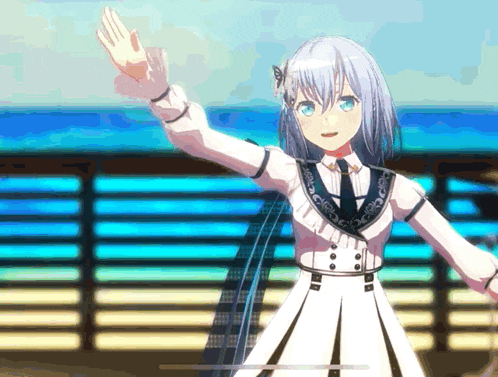 a girl in a white dress and black tie is waving her hand