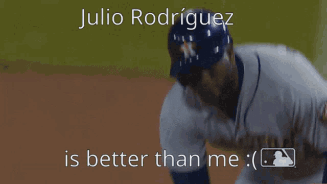 a baseball player with the name julio rodriguez on the front of his jersey