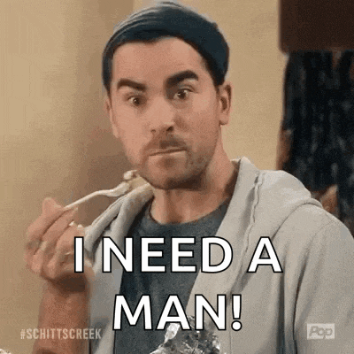 a man is eating food with a spoon and saying `` i need a man '' .