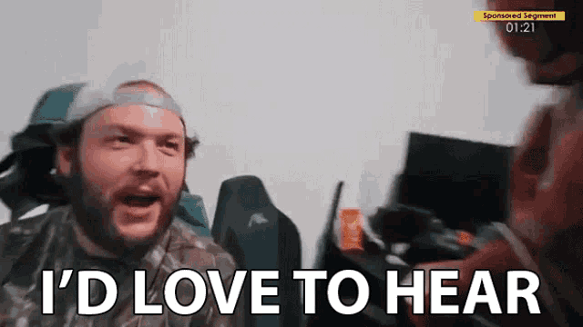 a man says i 'd love to hear in front of a computer