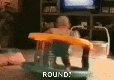 a baby is sitting in a walker and the words `` round '' are being displayed .
