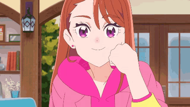a girl with purple eyes is wearing earrings and a pink coat
