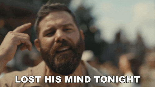 a man with a beard has lost his mind tonight written below him