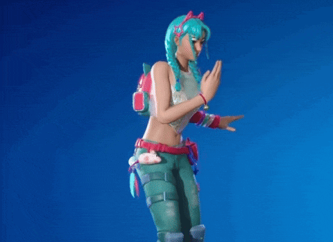 a woman with green hair is standing in front of a blue background and holding a red heart in her hand .