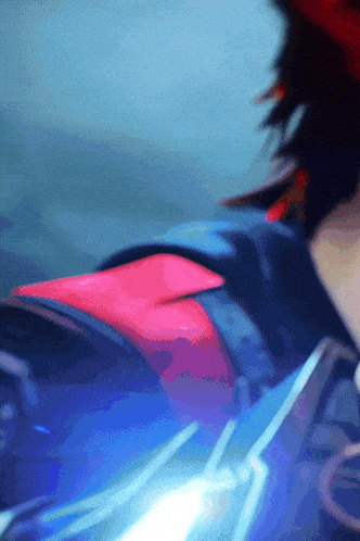 a close up of a person 's shoulder with a blue light behind them