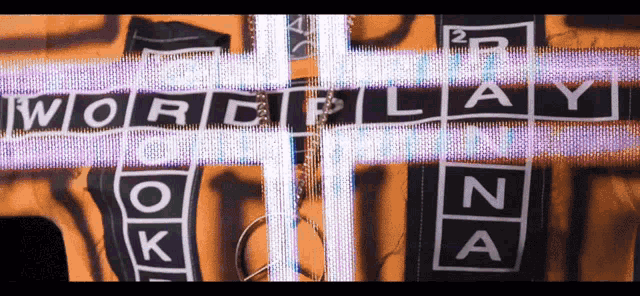 the word play is written on a purple and orange background