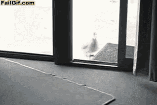 a sliding glass door with failgif.com written on the bottom of it