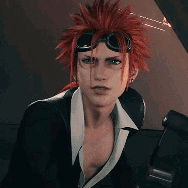 a man with red hair wearing goggles and a black jacket