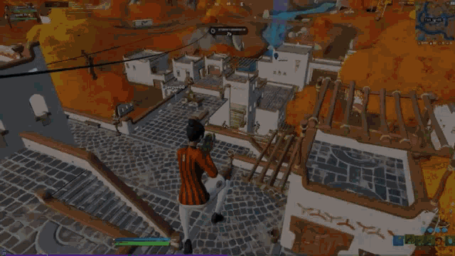 a man is sitting on a rock in a video game .