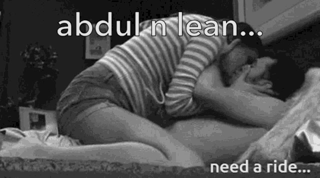 a black and white photo of a couple kissing on a bed with the caption `` abdul n lean ... need a ride ... ''