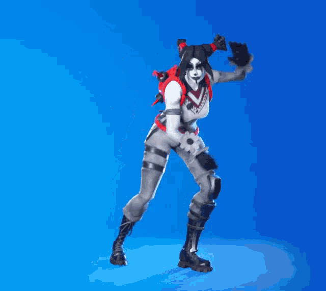 a woman is dancing in a video game on a blue background
