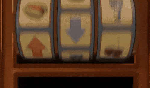 a slot machine with a blue arrow pointing to the right