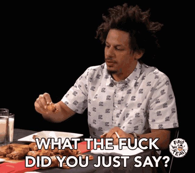 a man is sitting at a table with a plate of food and the words what the fuck did you just say