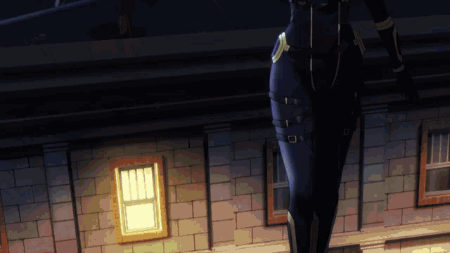 a person standing in front of a building with a window