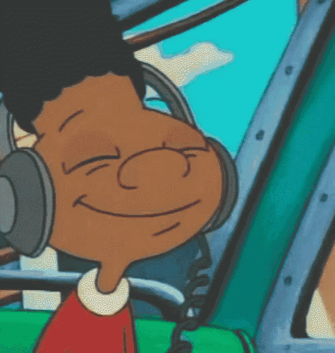 a cartoon character wearing headphones is smiling