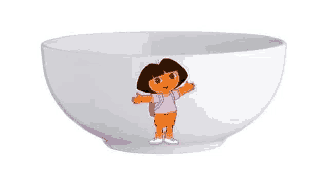 a white bowl with a dora the explorer cartoon on it .