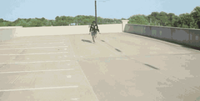 a man is running in a parking lot with the words let me tell you something written above him