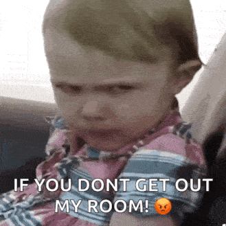 a baby is crying and making a funny face with the words if you dont get out my room !