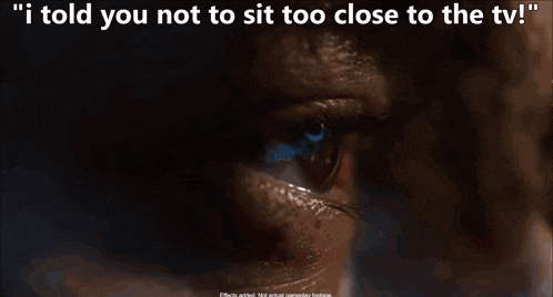 a tv screen shows a cartoon character with the words " i told you not to sit too close to the tv "