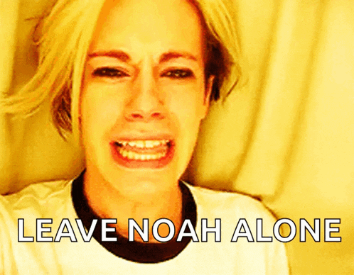 a woman is crying with the words " leave noah alone " above her
