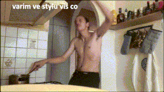 a shirtless man stirs a pot in a kitchen with the words varim ve stylu vis co below him