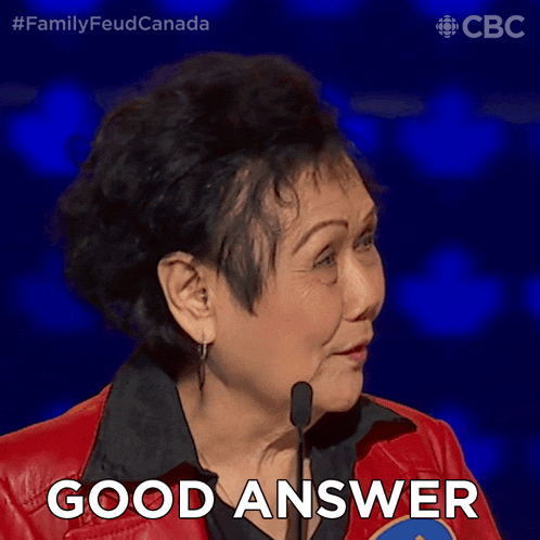 a woman in a red jacket says " good answer "