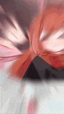 a blurred image of a person 's butt with a triangle in the background