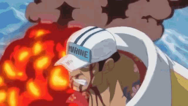 a man in a marine hat is smoking a cigarette .
