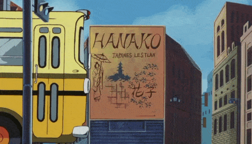 a yellow bus is parked in front of a sign for hanako japanese restaurant
