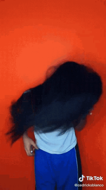 a tiktok video of a woman with long hair