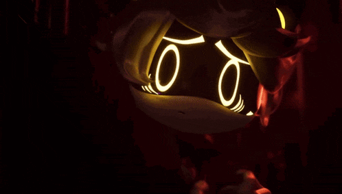 a close up of a cartoon character with glowing eyes in a dark room