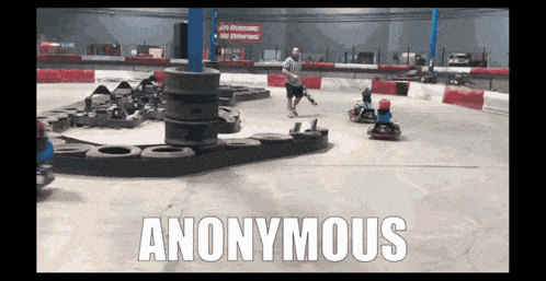 a video of people playing go karts with the words anonymous below them
