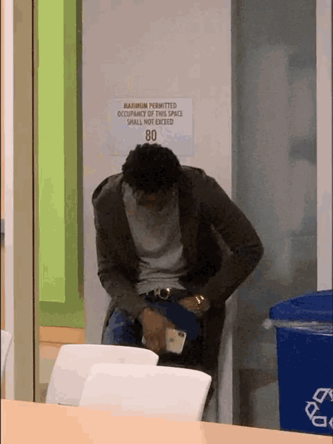 a sign on the wall says maximum permitted occupancy of this space is 80