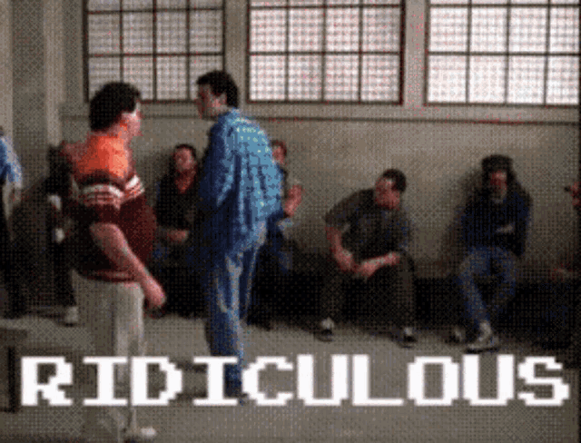a group of people are sitting in a room and the word ridiculous is on the screen