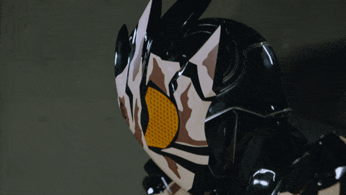 a close up of a helmet with a cartoon face on it