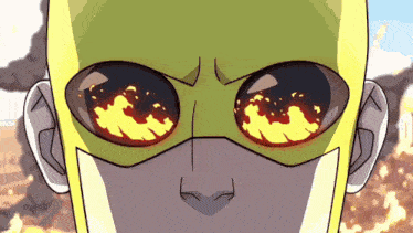 a close up of a cartoon character 's face with flames in his eyes
