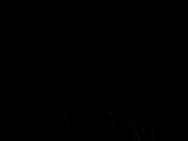 a man stands on top of a fence in front of a city skyline