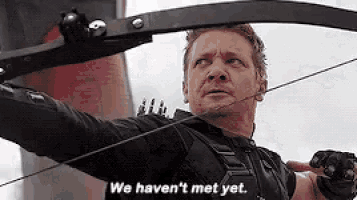 hawkeye is holding a bow and arrow and saying `` we haven 't met yet '' .
