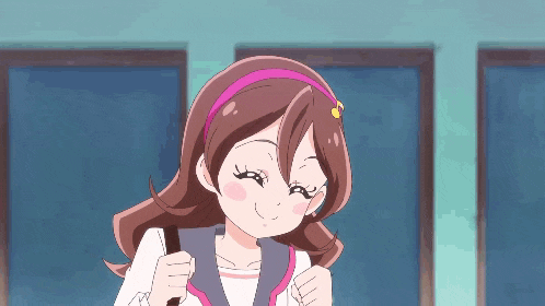 a cartoon girl with brown hair and a pink headband is smiling