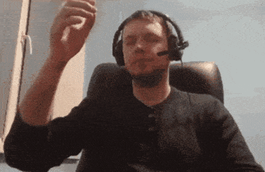 a man wearing headphones with a microphone on his head