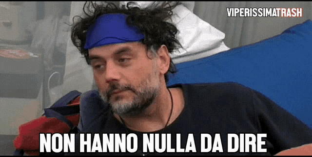a man with a blue headband on his head says non hanno nulla da dire
