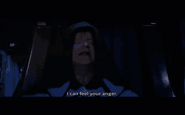 a man in a hooded robe says i can feel your anger