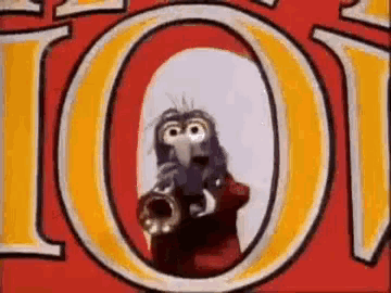 a cartoon bird is playing a trumpet in front of a red and yellow sign that says 101 .